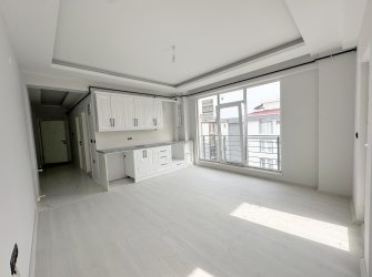 %80 İNE KREDİLİ ARA KAT SIFIR BALKONLU 1+1 DAİRE