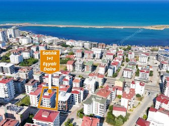 TRAMVAY DURAĞA VE SAHİLE YAKIN EŞYALI 1+1 SATILIK